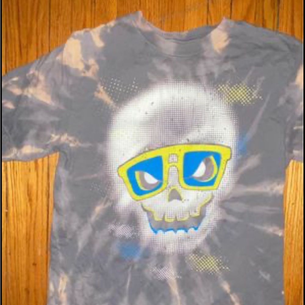 Children’s XL bleach dyed shirt would fit adult suede XS-S